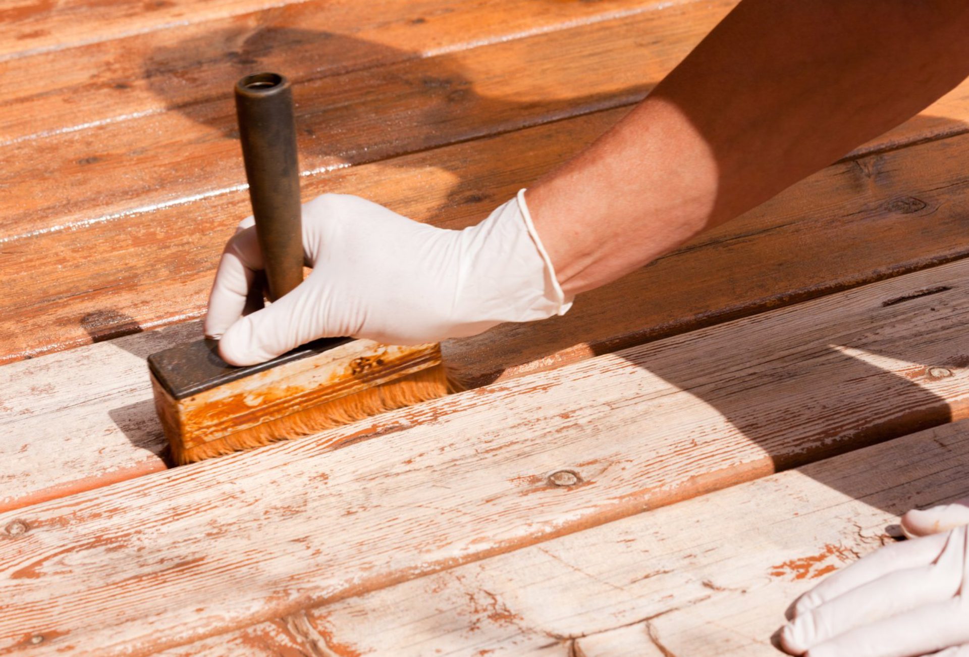 How Staining and Painting Revive Old Decks