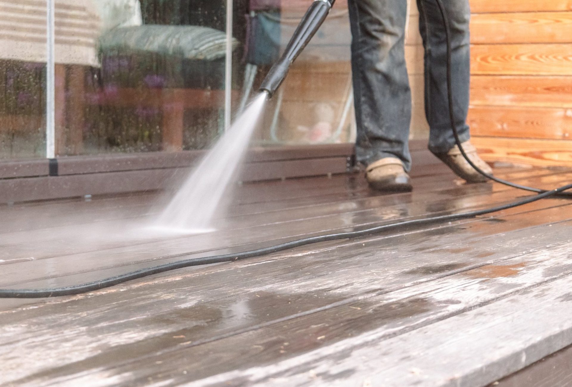 Why Pressure Washing Is Key Before Staining Decks